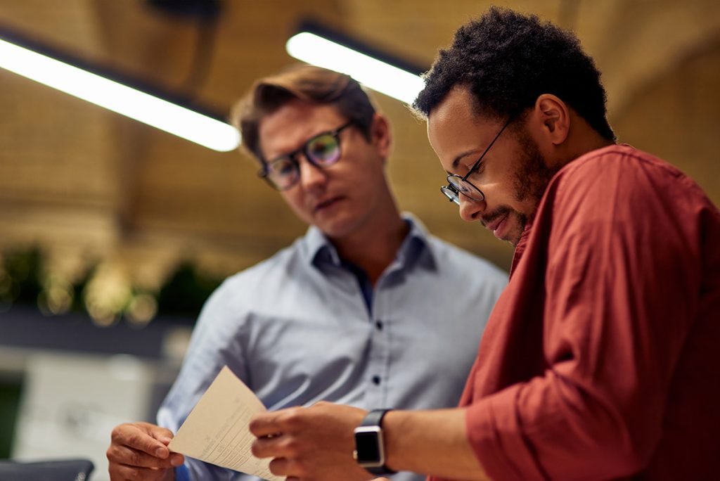 Employees looking at documents